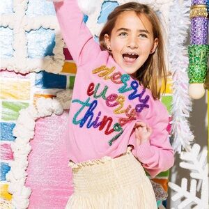 Pink Sweater with Colorful Text